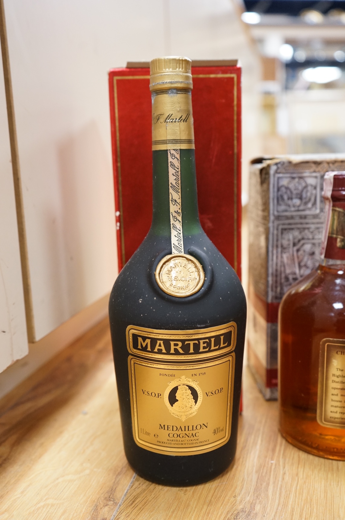 A bottle of Glenmorangie Scotch whisky and five other cased spirits